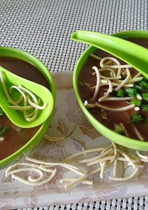 A picture of Vegetables manchau soup with homemade fried noodles.