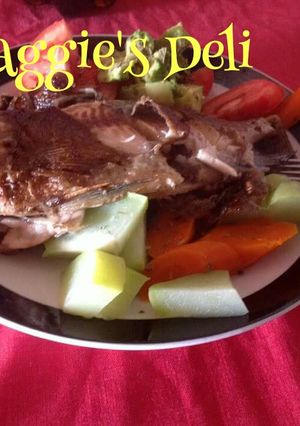 Una foto de Mojarra frita al mojo de ajo