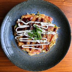 A picture of Okonomiyaki (Japanese Savory Pancake).