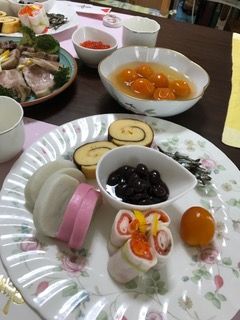 A picture of Kuromame for osechi ryori, black sweet soybeans.