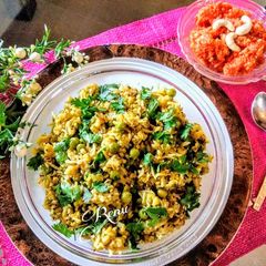A picture of Moong Matar Khichdi with Gajar Halva.