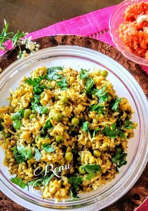 A picture of Moong Matar Khichdi with Gajar Halva.