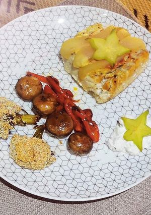 Une photo de Filet de lieu noir en papillote et ces petits légumes