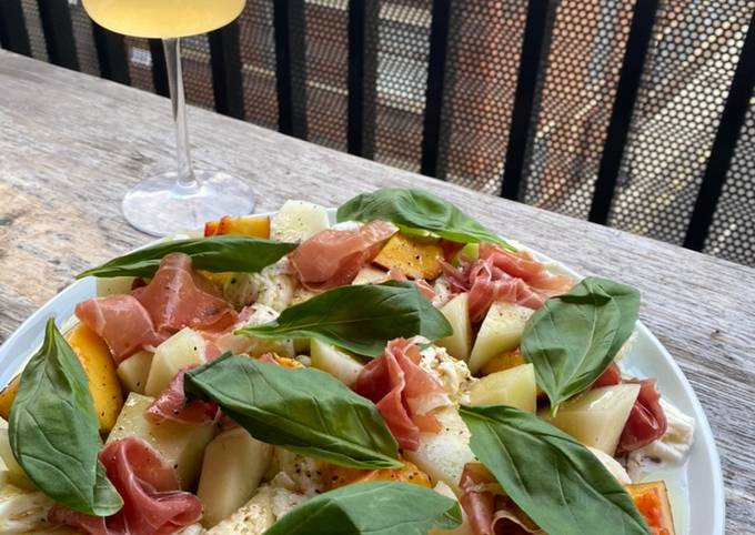 Simple melon, nectarine, mozzarella, Parma ham and basil salad