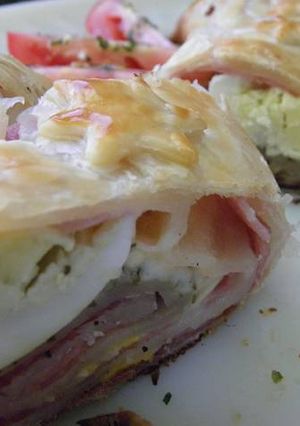 Una foto de Rollo de jamón y queso