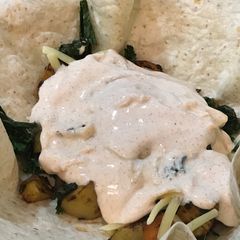 Vegetarian Delicious Wrap Roasted veggies & smoked paprika yogurt sauce A picture of Vegetarian Delicious Wrap Roasted veggies & smoked paprika yogurt sauce.