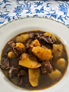 Una foto de Papas con carne