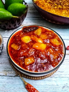 A picture of Vaghariyu / Sweet n Sour Mango Pickle.