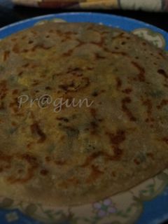 A picture of Aloo/ Paneer Paratha.
