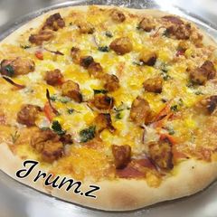 A picture of 🍕🍕Chicken Tikka Pizza🍕🍕.