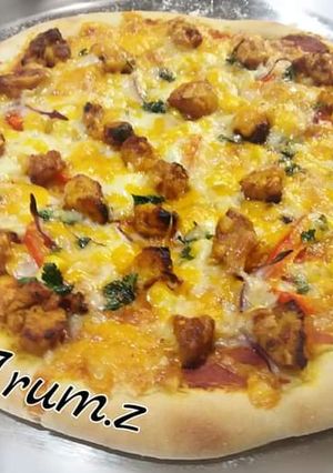 A picture of 🍕🍕Chicken Tikka Pizza🍕🍕.