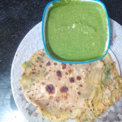 A picture of Aloo paratas with Green Mint Yoghurt Chutney.