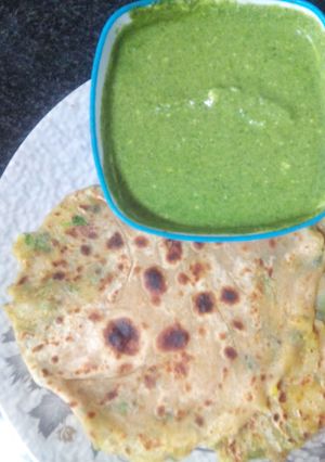 A picture of Aloo paratas with Green Mint Yoghurt Chutney.
