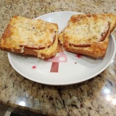 A picture of Salami and cheese toast.