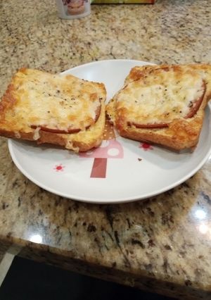 A picture of Salami and cheese toast.