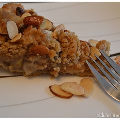 A picture of Apple Pie with streusel almond topping.