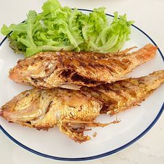 A picture of Deep Fried Golden Threadfin Bream With Fresh Turmeric.
