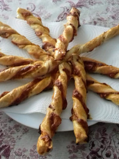 Una foto de Palitos hojaldrados de pizza