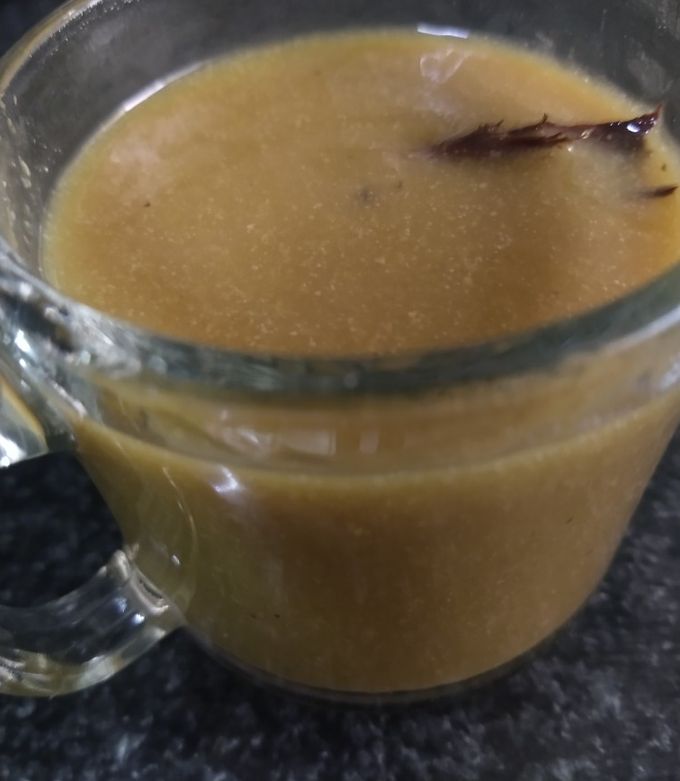 Una foto de Atole de masa con piloncillo
