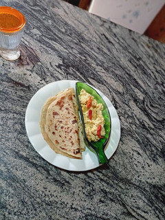 A picture of Flat bread and cream eggs.