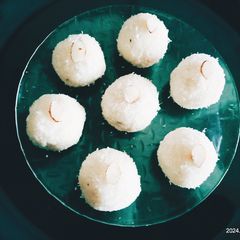 A picture of Delicious healthy yummy desiccated coconut ladoo.