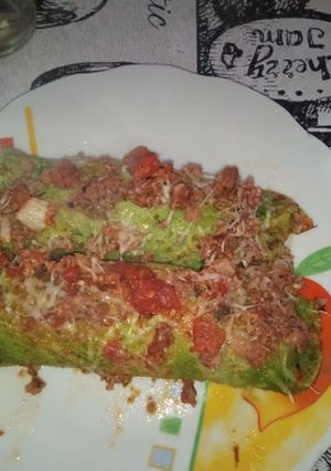 Una foto de Canelones de espinaca rellenos con carne y verdura