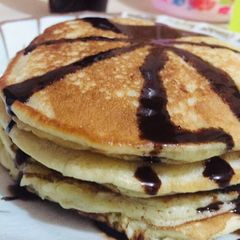 Fluffy pancakes 🥞 with chocolate glazing A picture of Fluffy pancakes 🥞 with chocolate glazing.