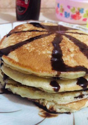 A picture of Fluffy pancakes 🥞 with chocolate glazing.