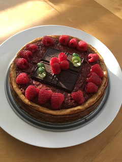 A picture of Dark Chocolate Coconut Raspberry Cheesecake.