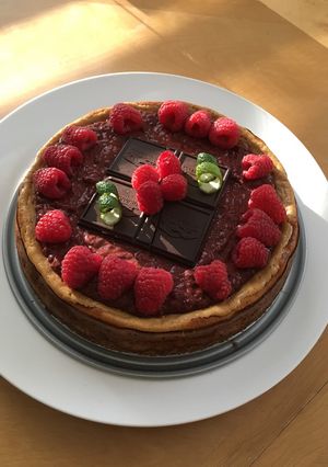 A picture of Dark Chocolate Coconut Raspberry Cheesecake.