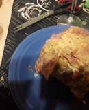 Bola de lomo de cerdo rellena con salsa crema de pomelo rosado