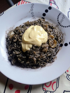 Una foto de Arroz negro con sepia