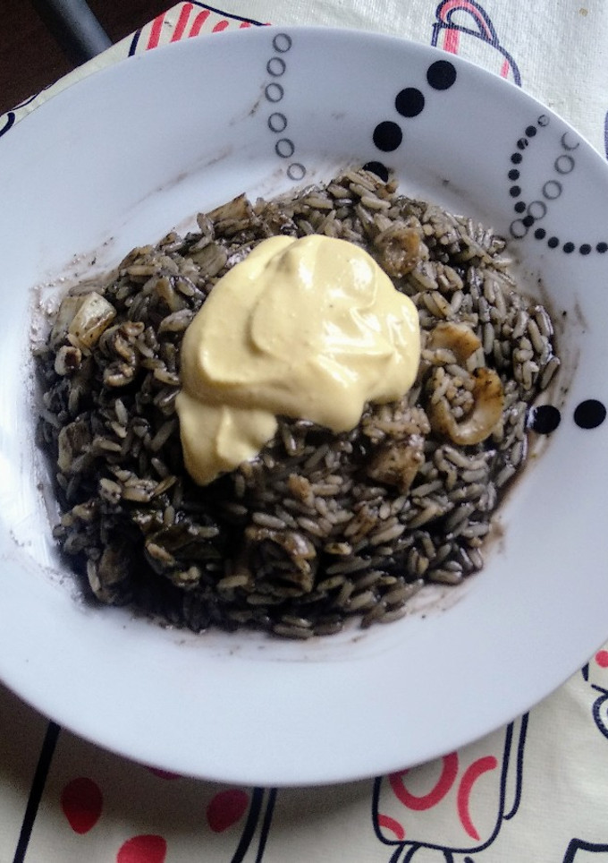 Una foto de Arroz negro con sepia