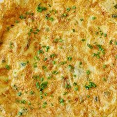 A picture of Egg cheese pizza omeleete.
