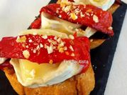 Una foto de pimiento rojo caramelizado