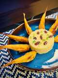 Salmonetes en harina de garbanzo con cous cous aromatizado con hierbabuena y comino