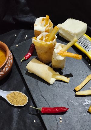 A picture of Paneer fries cheese loaded dosa.
