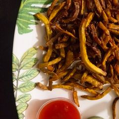 A picture of French fries in Air fryer.