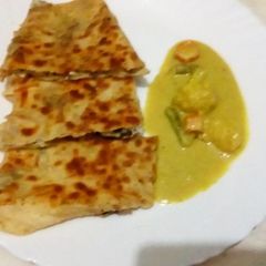 Egg stuffed paratha A picture of Egg stuffed paratha.