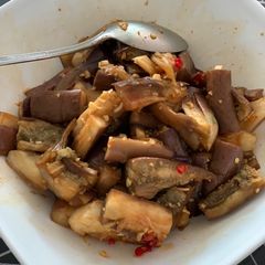 A picture of Steamed Eggpant Soya Sauce.