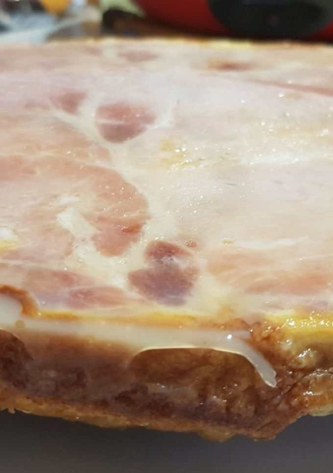 Una foto de Pastel de queso y york