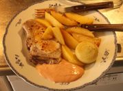 Una foto de costeletas al horno