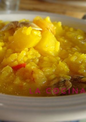 Una foto de Arroz con nabos y almejas