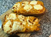 Una foto de calabacines rellenos al horno