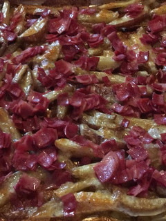Una foto de Papas al horno con tocino y queso