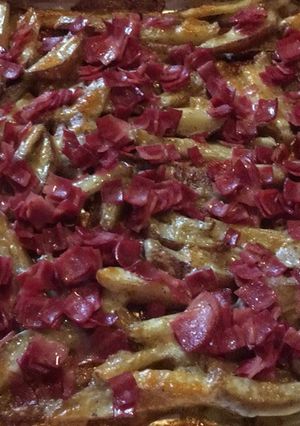 Una foto de Papas al horno con tocino y queso
