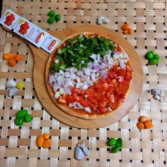 A picture of Trirangi mozzarella pizza.