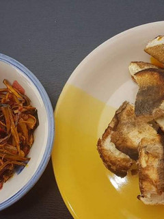 A picture of Roasted yam with palmoil and ugba.