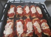 Una foto de canelones de acelga