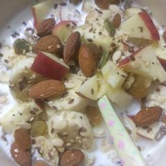 A picture of Over Night Soaked oat with fruits and dry fruits.
